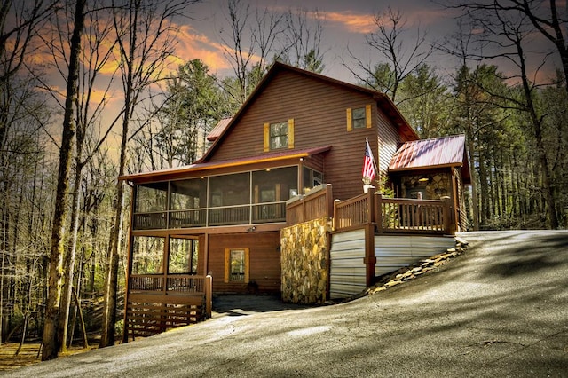 30 Okemah Ct, Ellijay, GA 30540 - view of front of property with a sunroom
