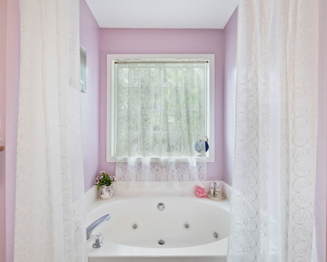 bathroom with a bathing tub