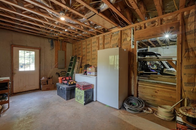 basement featuring electric panel