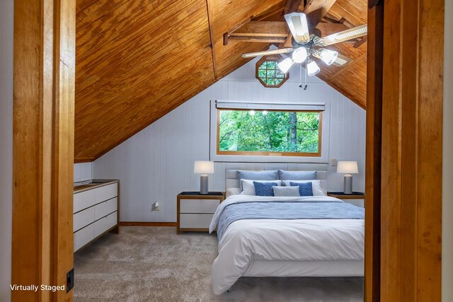 bedroom featuring baseboards, a textured ceiling, ensuite bath, and wood finished floors