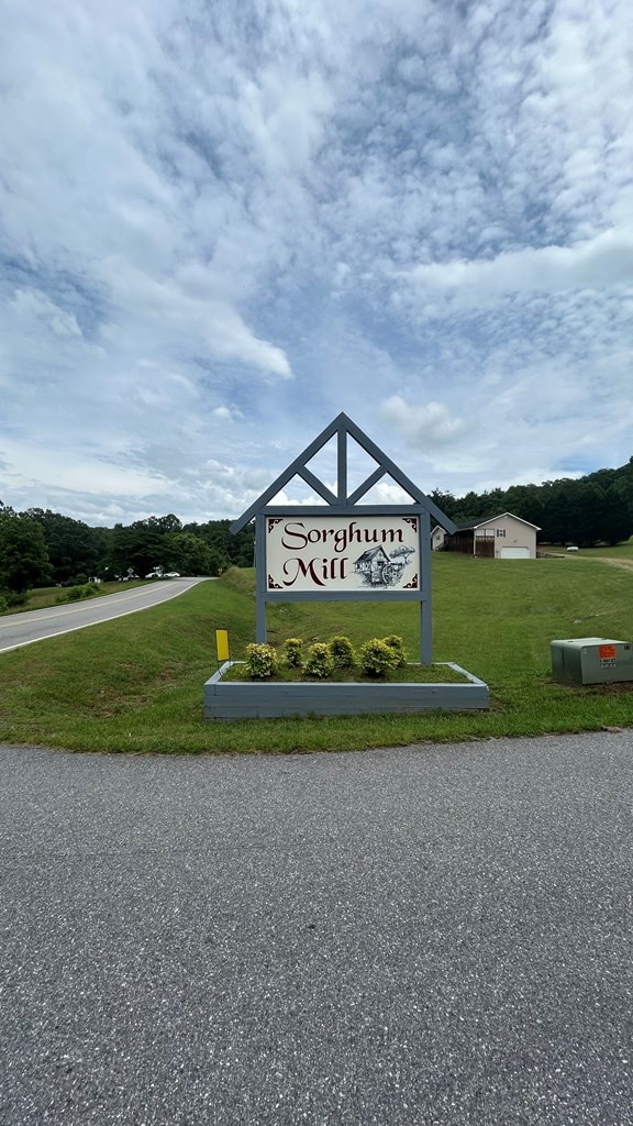 143 Sorghum Mill Run, Blairsville, GA 30512 - community sign with a lawn