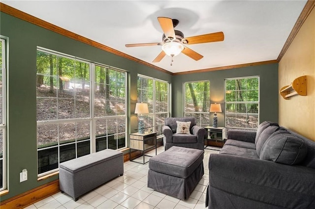 sunroom / solarium with a wealth of natural light and a ceiling fan