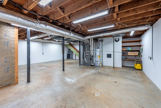 basement with gas water heater and heating unit