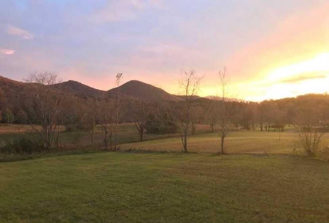 198 Ivy Knob Ln, Hayesville, NC 28904 - yard at dusk with a yard, a mountain view, and a rural view