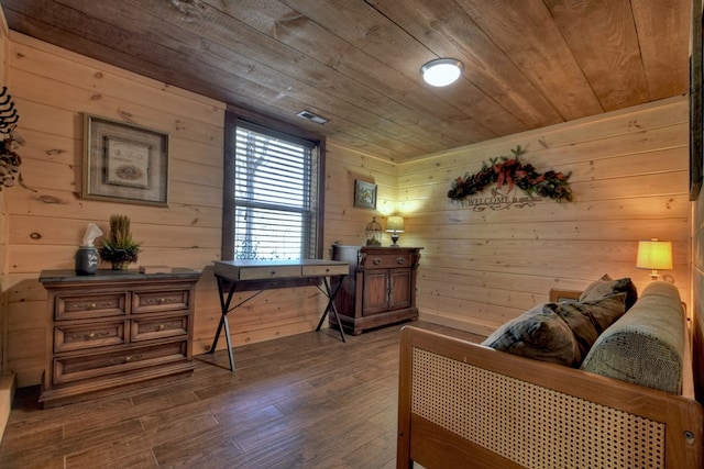 office space with wooden ceiling, wood finished floors, and wood walls