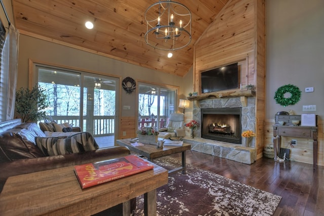 living area with a notable chandelier, a stone fireplace, high vaulted ceiling, wooden ceiling, and hardwood / wood-style floors