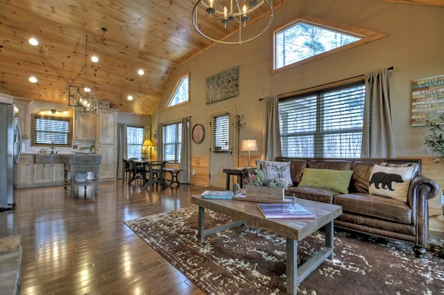 living room with a chandelier, wooden ceiling, plenty of natural light, and hardwood / wood-style flooring