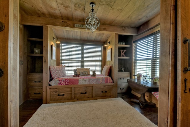 bedroom with wooden ceiling, dark wood-style flooring, and an inviting chandelier