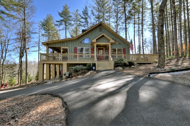 chalet / cabin with a wooden deck