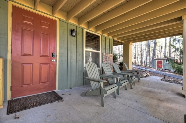 view of patio featuring a porch