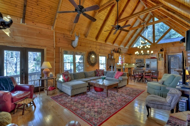 living room with hardwood / wood-style flooring, wood ceiling, and wooden walls