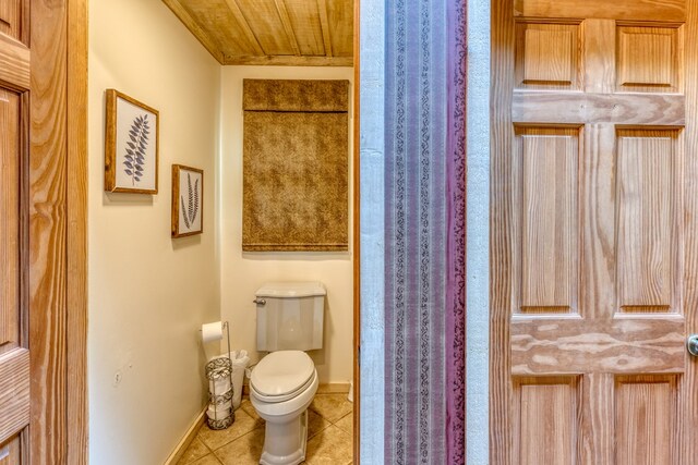 50 Rustic Rdg, Blue Ridge, GA 30513 - bathroom featuring tile patterned flooring, toilet, wooden ceiling, and baseboards