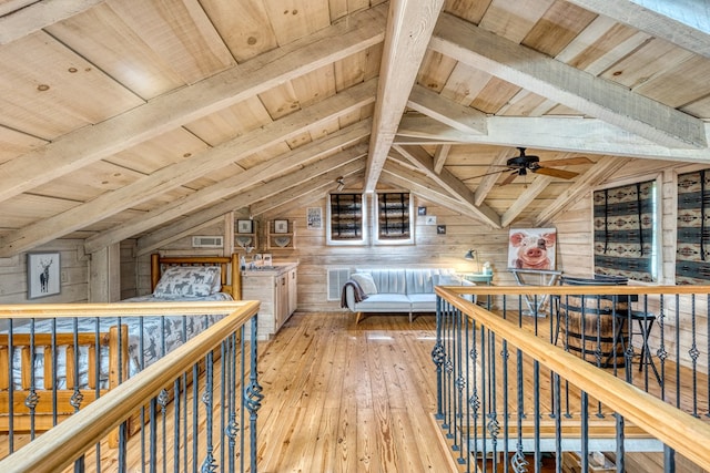 50 Rustic Rdg, Blue Ridge, GA 30513 - sitting room with wooden ceiling, wooden walls, light wood-style flooring, a ceiling fan, and an upstairs landing