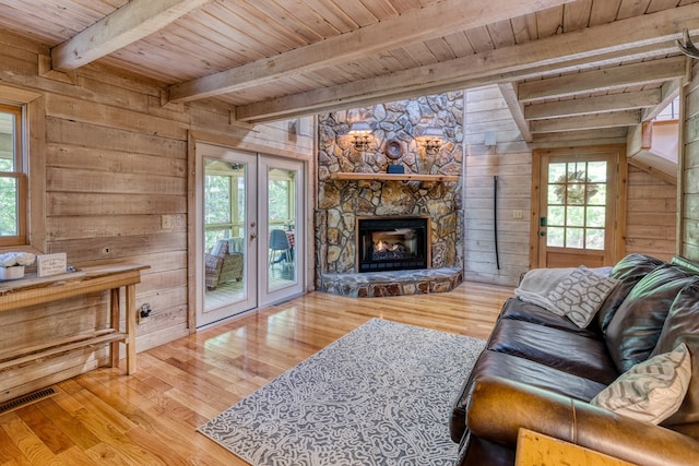 50 Rustic Rdg, Blue Ridge, GA 30513 - living room featuring wood ceiling, wood finished floors, healthy amount of natural light, wood walls, and a fireplace