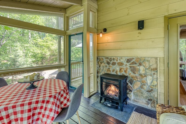 50 Rustic Rdg, Blue Ridge, GA 30513 - sunroom / solarium with a wood stove and a stone fireplace
