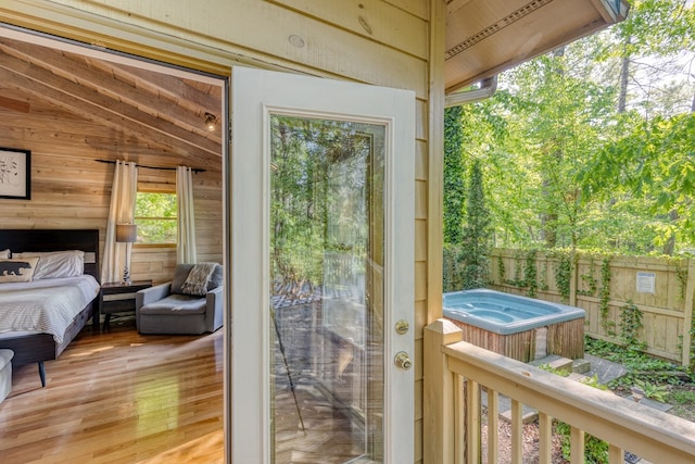 50 Rustic Rdg, Blue Ridge, GA 30513 - doorway featuring vaulted ceiling, wooden walls, light wood-style floors, and healthy amount of natural light