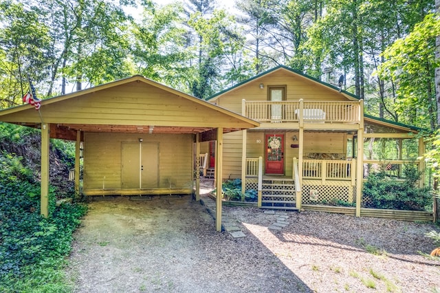 50 Rustic Rdg, Blue Ridge, GA 30513 - rustic home featuring a carport and a porch