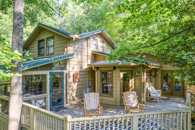 50 Rustic Rdg, Blue Ridge, GA 30513 - back of property with a wooden deck and french doors