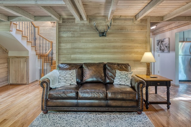 50 Rustic Rdg, Blue Ridge, GA 30513 - living area with wood walls, wood ceiling with exposed beams, wood finished floors, stairway, and baseboards