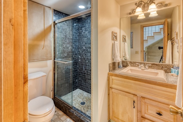 50 Rustic Rdg, Blue Ridge, GA 30513 - full bath with toilet, a stall shower, vanity, and a chandelier