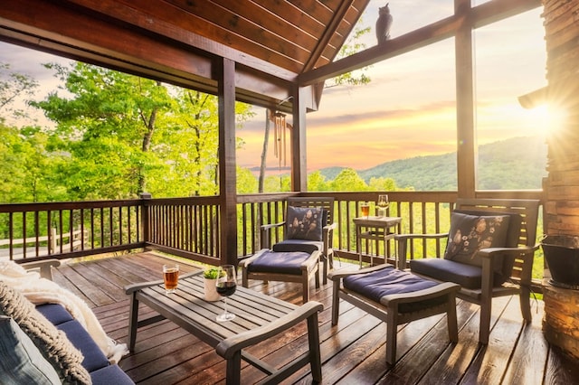 deck at dusk with a mountain view