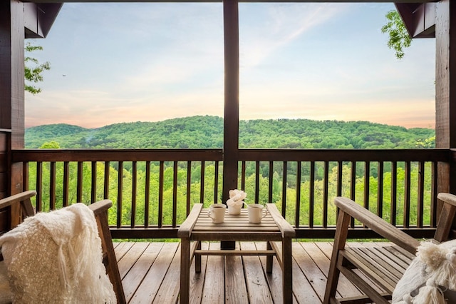 deck at dusk with a lawn