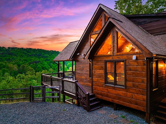 view of property exterior at dusk