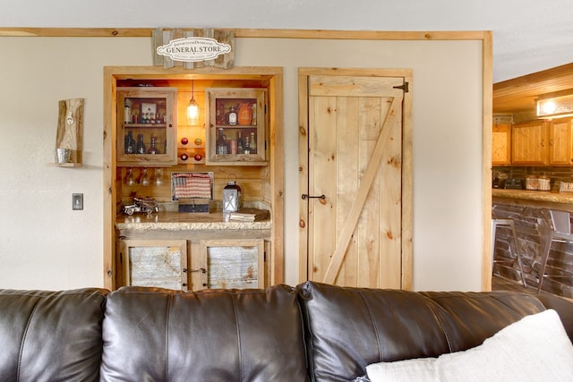 living room featuring bar area