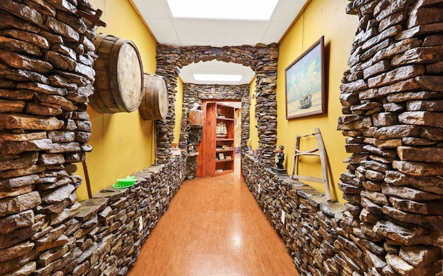 wine room with light wood-type flooring