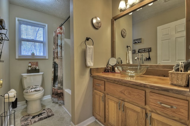 full bathroom with vanity, tile patterned floors, toilet, shower / bathtub combination with curtain, and a textured ceiling