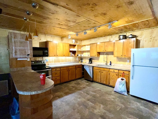 37 Shady Creek Rdg, Marble, NC 28905 - kitchen with open shelves, a peninsula, a sink, track lighting, and appliances with stainless steel finishes