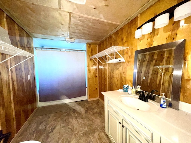 37 Shady Creek Rdg, Marble, NC 28905 - bathroom featuring wooden walls, curtained shower, and vanity