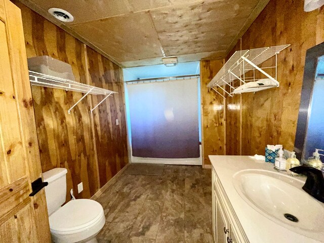 37 Shady Creek Rdg, Marble, NC 28905 - bathroom featuring vanity, toilet, visible vents, and wood walls