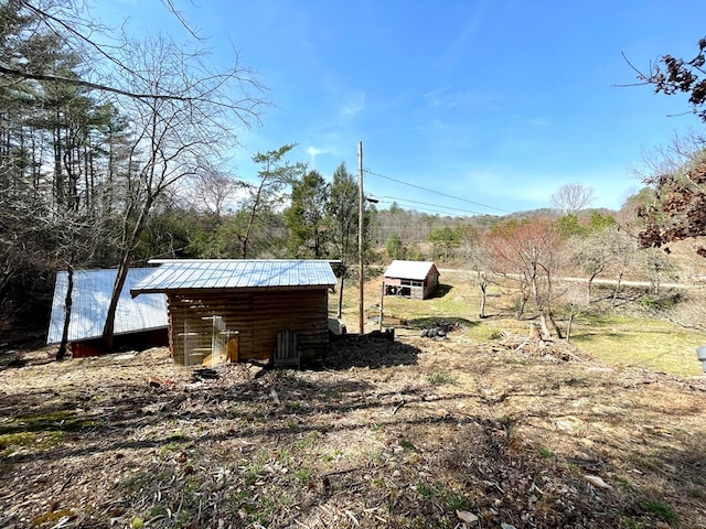 37 Shady Creek Rdg, Marble, NC 28905 - view of yard with a storage shed and an outdoor structure