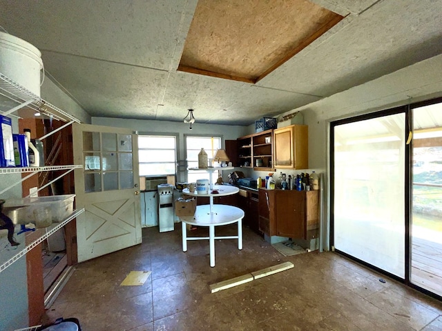 37 Shady Creek Rdg, Marble, NC 28905 - kitchen with brown cabinetry and open shelves