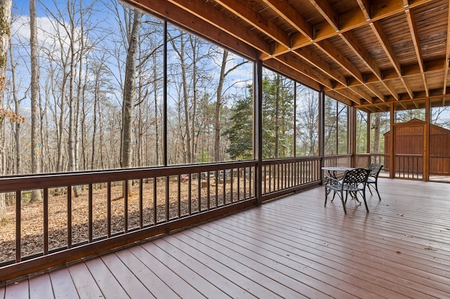 deck featuring an outbuilding