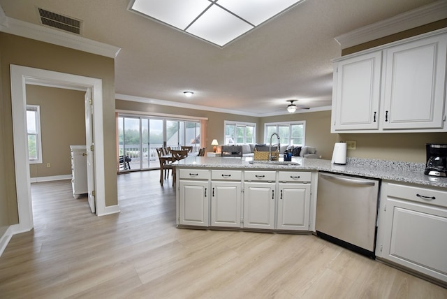 kitchen featuring white cabinetry, dishwasher, ceiling fan, sink, and light wood-type flooring