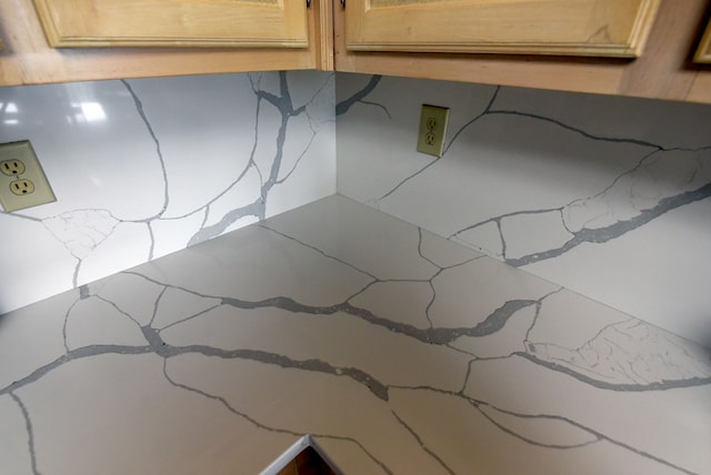 room details featuring light brown cabinets