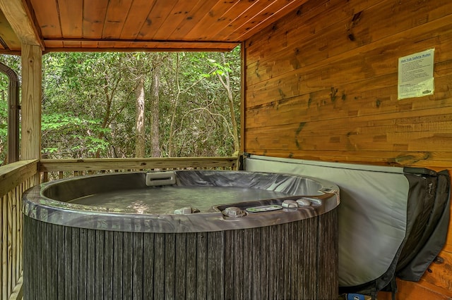 exterior space with a hot tub