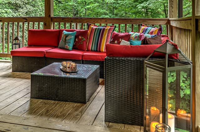 wooden terrace featuring an outdoor living space