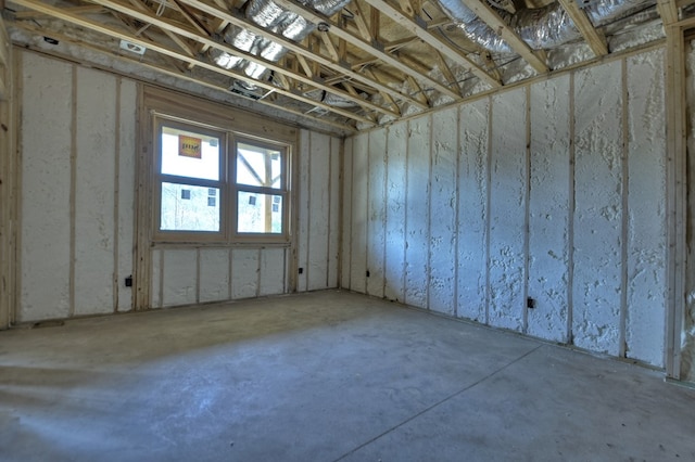 interior space featuring concrete flooring