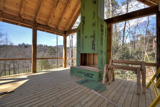 wooden terrace with a mountain view