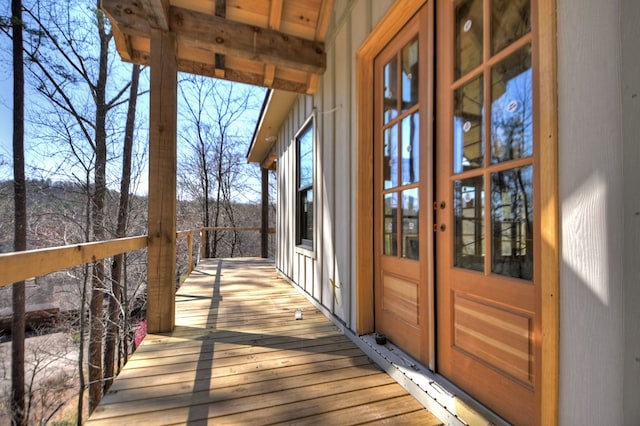 wooden deck featuring french doors
