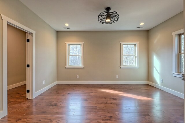 foyer featuring dark hardwood / wood-style flooring and high vaulted ceiling