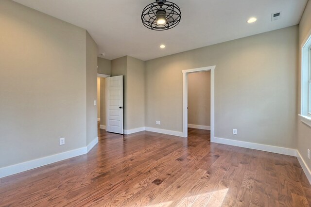 bathroom with vanity and hardwood / wood-style flooring