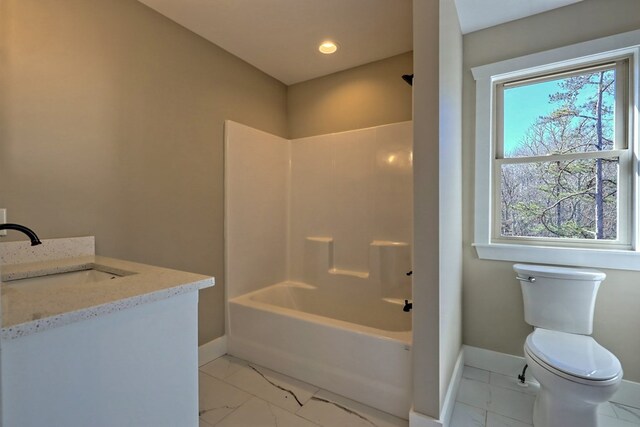 spare room with ceiling fan and wood-type flooring