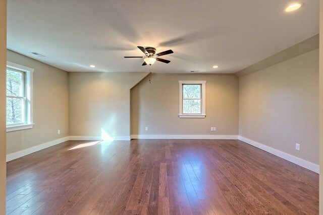 bathroom with vanity, hardwood / wood-style flooring, and tub / shower combination