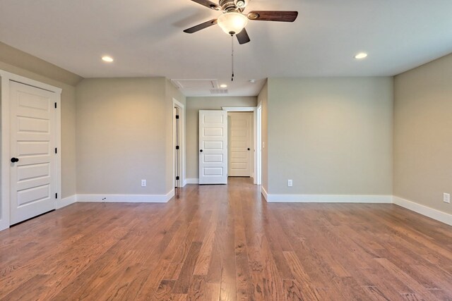 additional living space with dark hardwood / wood-style flooring, ceiling fan, and lofted ceiling