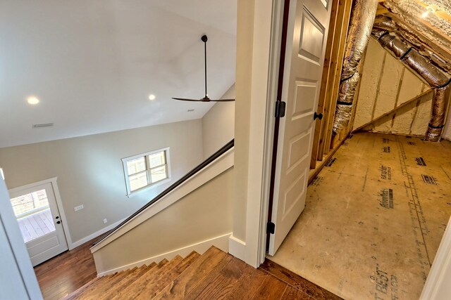 spare room featuring ceiling fan and dark hardwood / wood-style floors