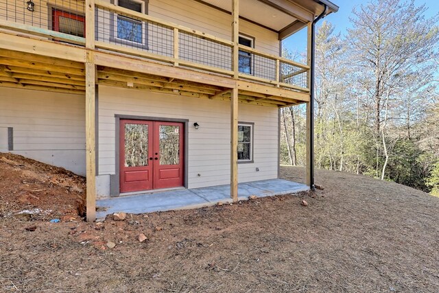 doorway to property with a patio